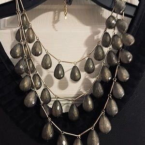 Vintage 3 strand necklace with metal and almond shaped beads in grayish color